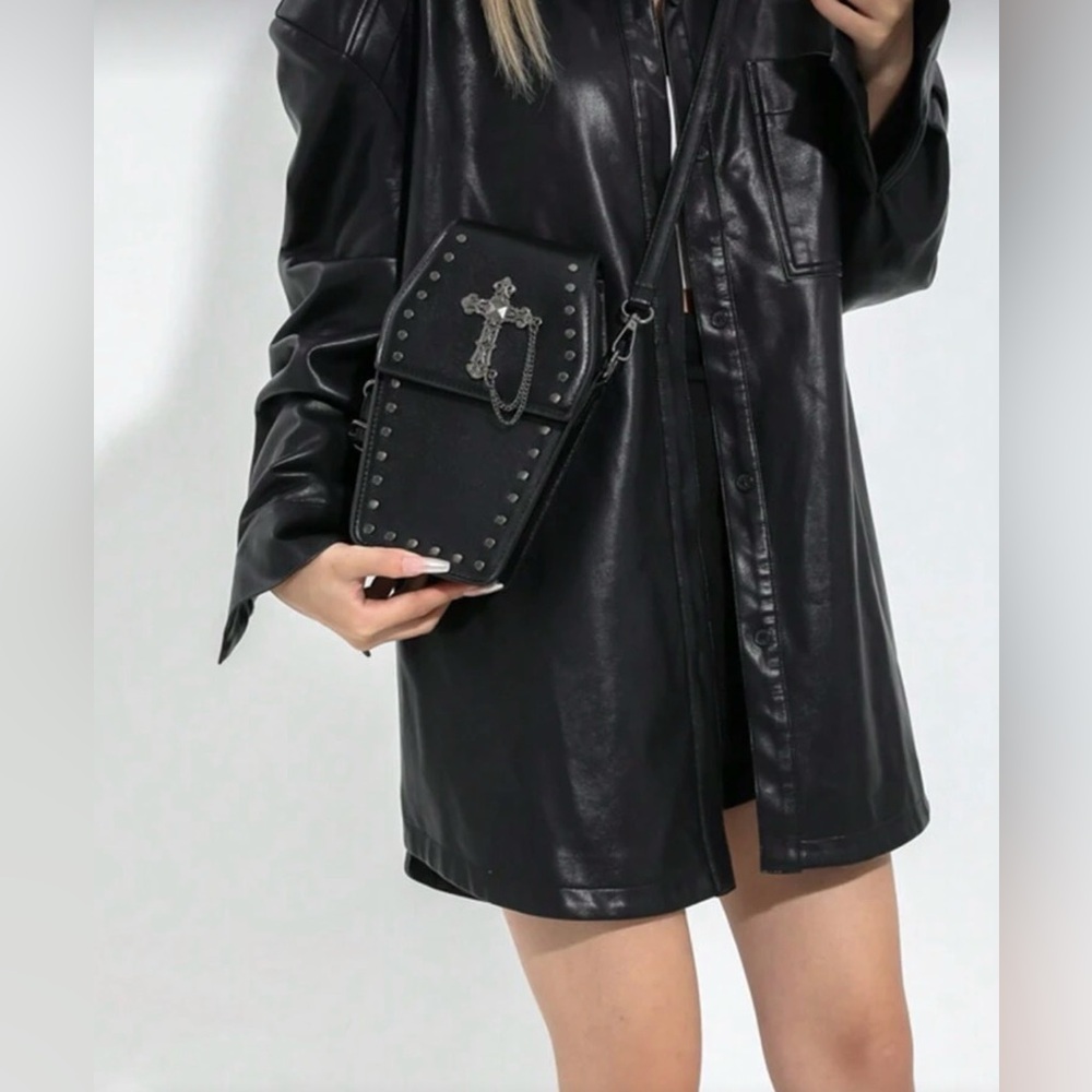 Unique, faux  leather coffin bag with cross and grommets